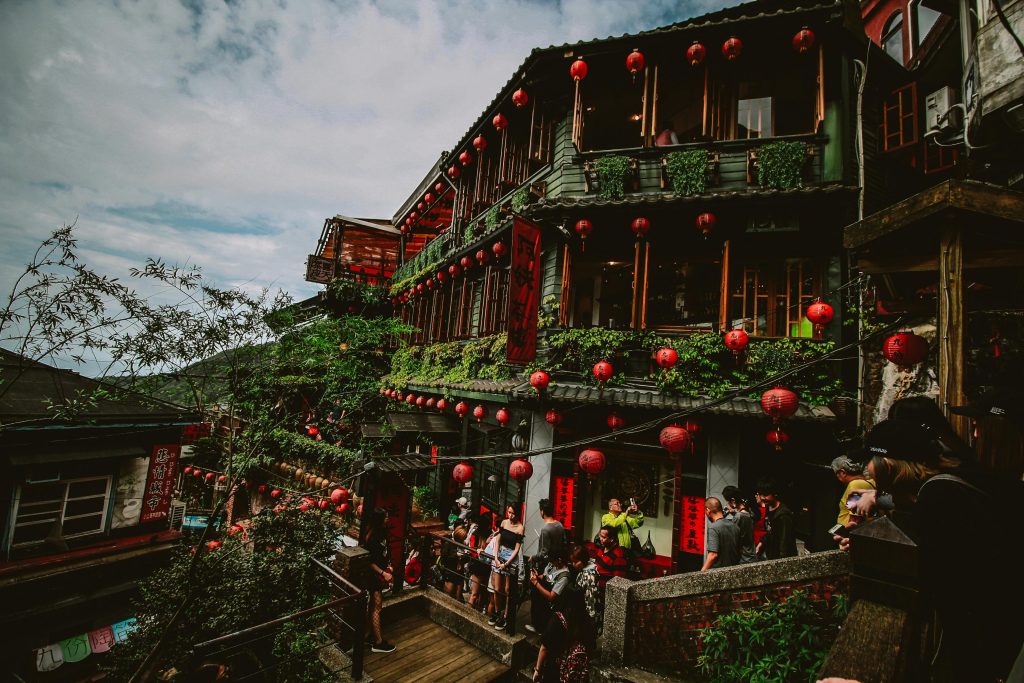 Explore Jiufen's vibrant streets with iconic red lanterns in New Taipei City, Taiwan.